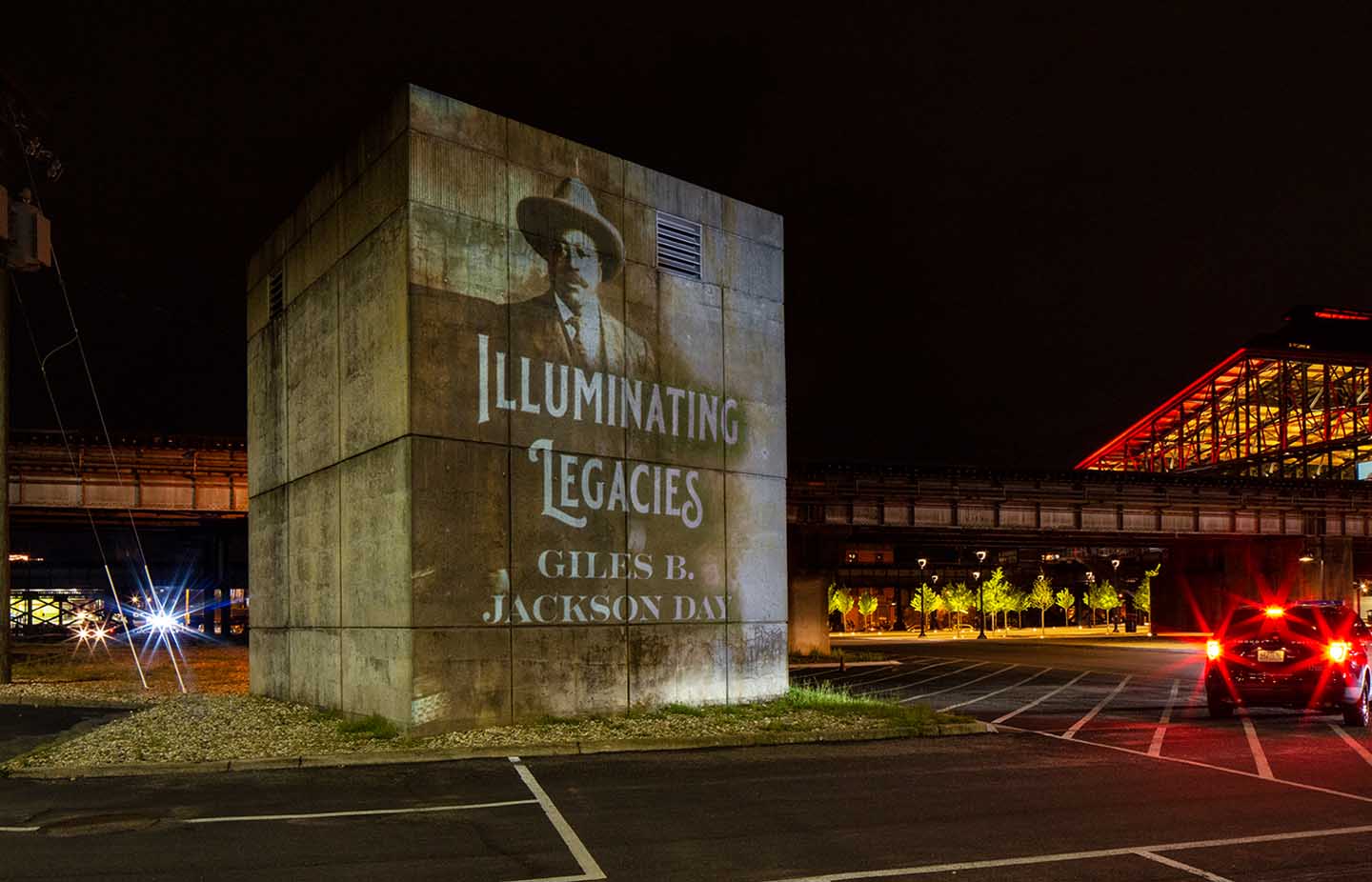 A projection of Giles B. Jackson near Main Street Station during Giles B. Jackson Day on April 17, 2021.