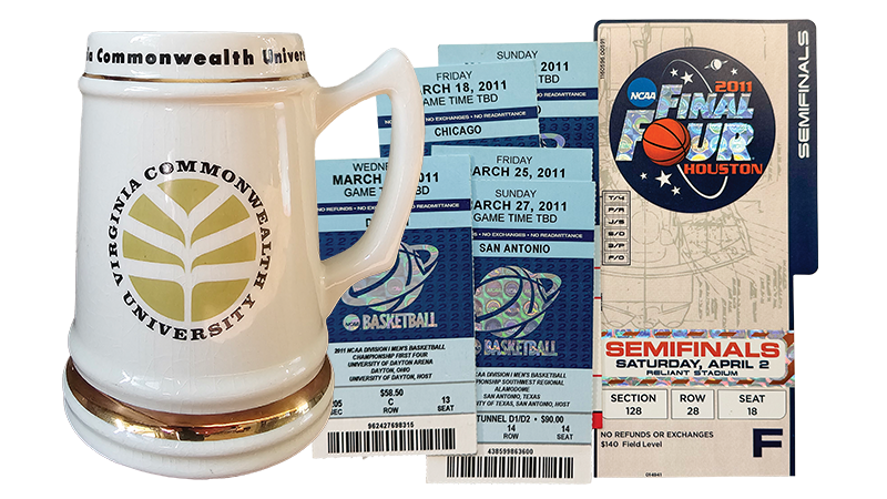 A beer mug and ticket stubs