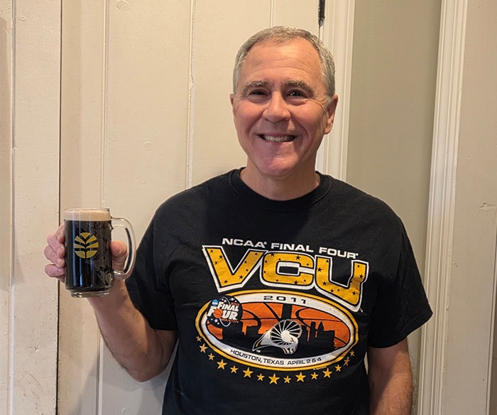 Jim Gillespie with a beer mug