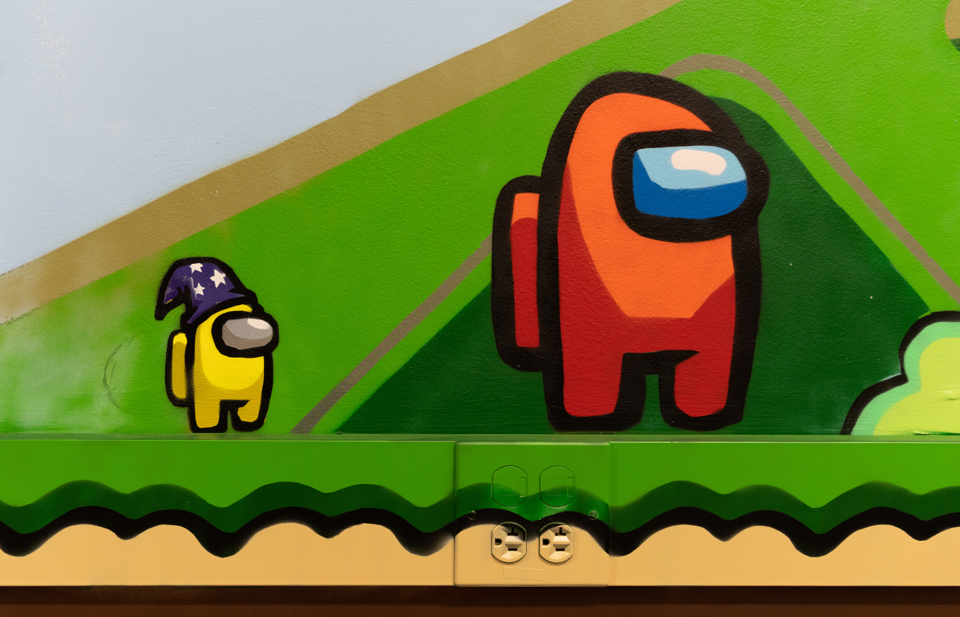 A small section of a mural, featuring characters from the game Among Us