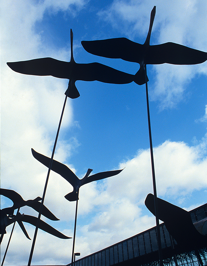 a set of statues of geese