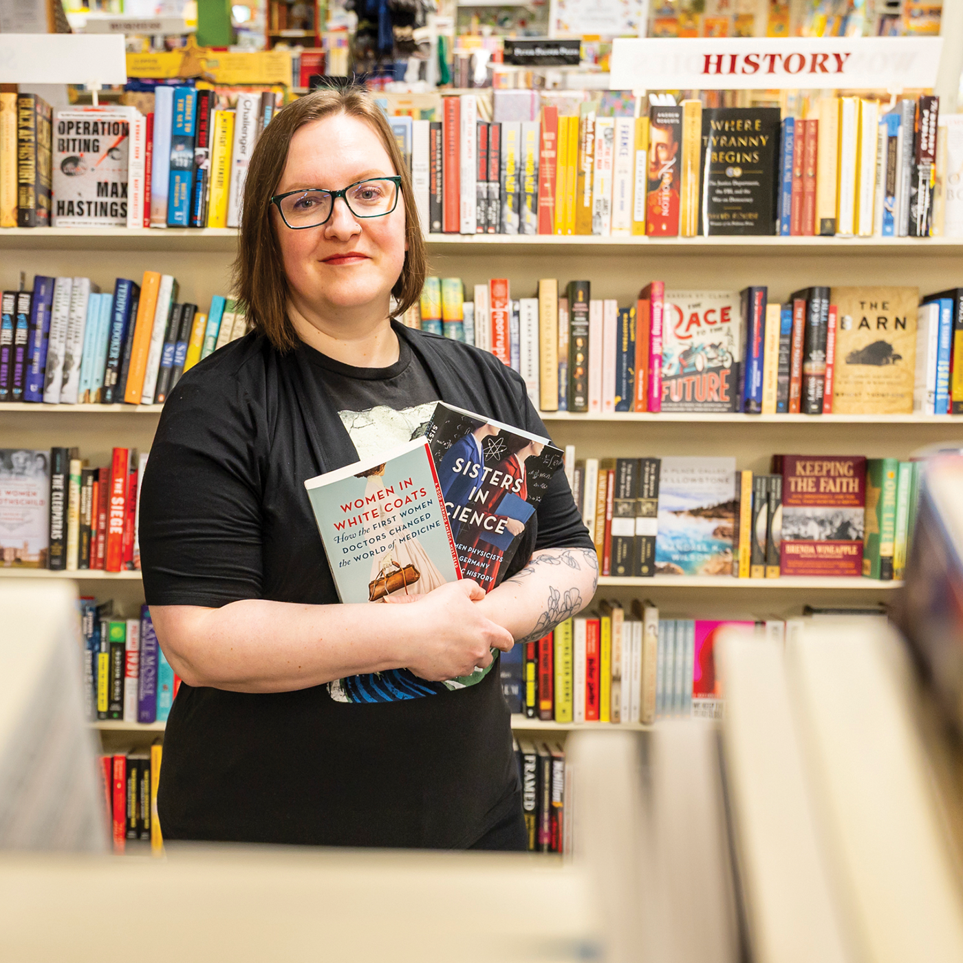 Olivia Campbell in The Doylestown Bookshop near her home in Pennsylvania, with her first two books; she has a third in the works.