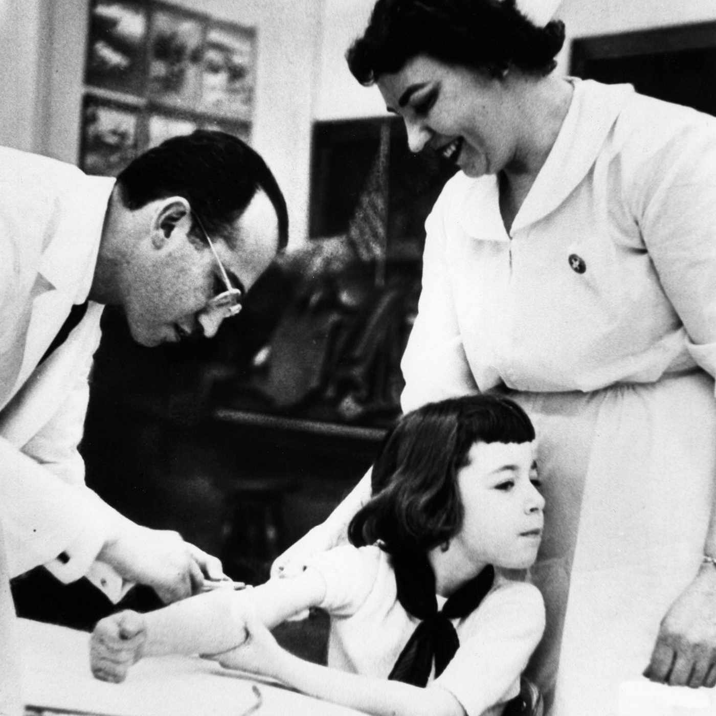 photo of Jonas Salk administering the polio vaccine